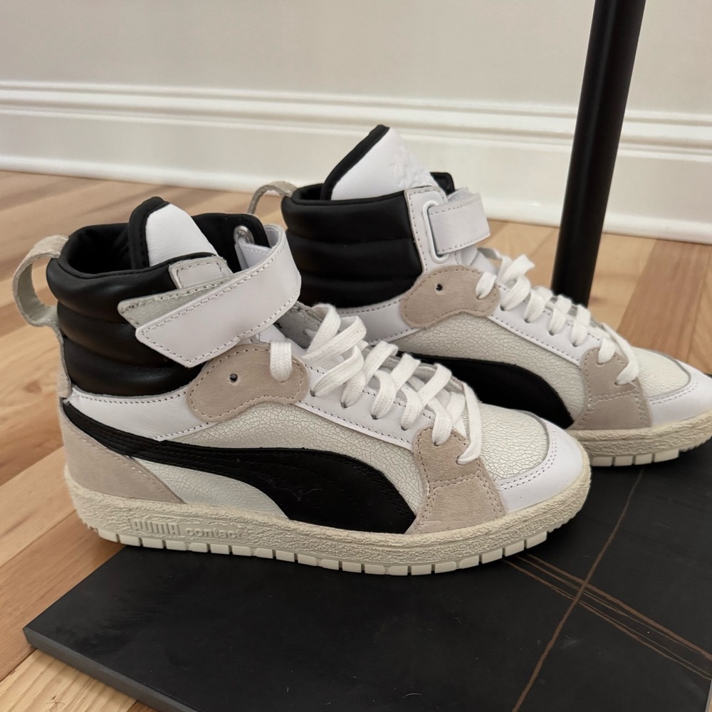 Puma High-Top Sneakers in Black, White, and Cream